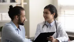 Doctor and patient talking